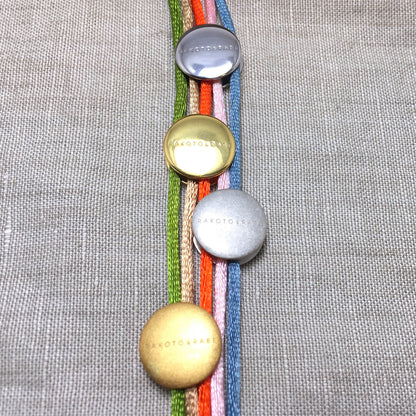Armband Zebu Horn mit Satin Kordel Sterling Silber / vergoldet